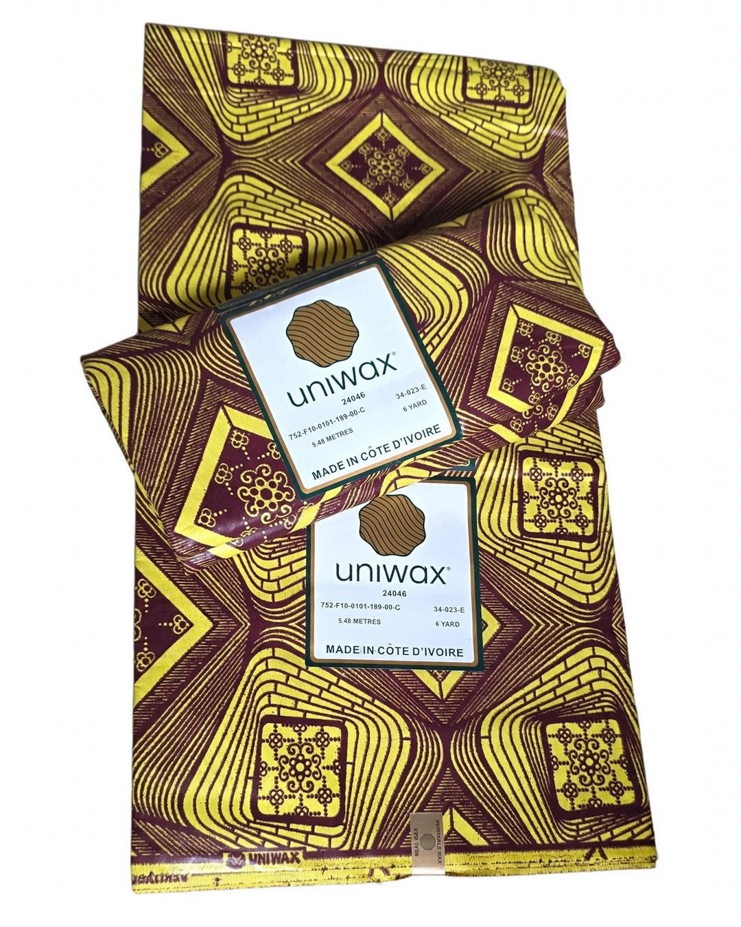 High-quality Côte d'Ivoire African Wax Print (Unisco Uniwax) New in
Yellow & maroon geometric real wax print, vibrant in person.
6 yards per piece